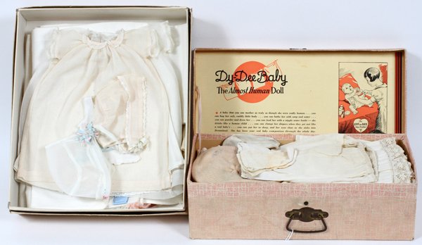 PIECES OF DOLL CLOTHING & DY-DEE BABY STORAGE BOX (1 of 2)