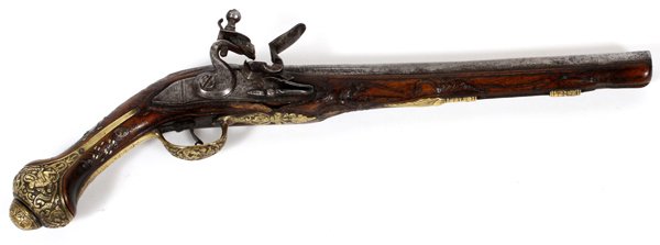 EUROPEAN .65 CAL FLINTLOCK PISTOL 18TH C: EUROPEAN .65 CAL FLINTLOCK PISTOL, 18TH C, L 12" BBL.:Having a carved walnut stock with silver inlays. Brass butt cap with figures in high relief. Brass engraved trigger guard. Engraved brass ramrod r