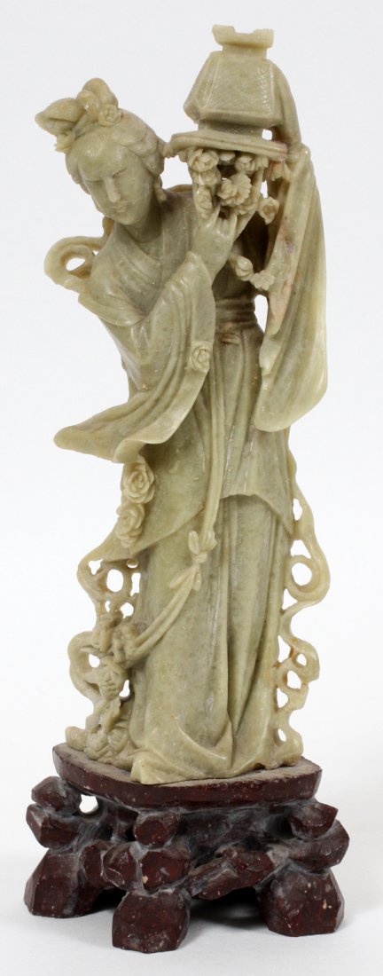 CHINESE CARVED SOAPSTONE FIGURE: CHINESE CARVED SOAPSTONE FIGURE, H 9 7/8":Depicting a lady holding a lantern, mounted to a teakwood base. For a high resolution photo CLICK HERE
