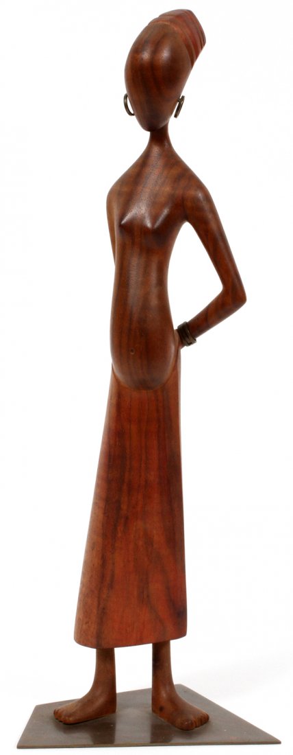 FRANZ HAGENAUER TEAKWOOD & BRASS AFRICAN FIGURE: FRANZ HAGENAUER (AUSTRIAN, 1906-1986), TEAKWOOD & BRASS AFRICAN FIGURE, WIEN, H 15 1/2":Carved as a standing woman with hands behind her back, adorned with metal earrings and bracelets, on a trapezoid