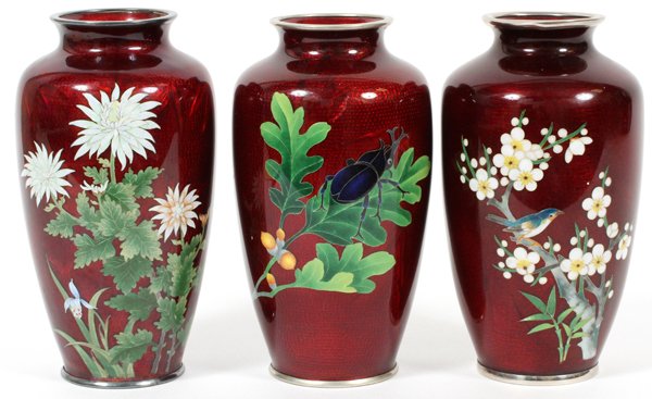 JAPANESE FOIL CLOISONNÉ ENAMEL VASES, THREE: JAPANESE FOIL CLOISONNÉ ENAMEL VASES, THREE, H 7 1/4":Including three baluster form vases, one decorated with a beetle and leaf, and two others with flowering plants. No apparent markings. For a high