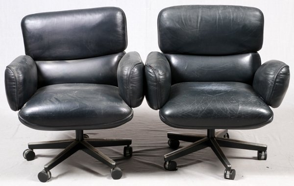 KNOLL BLACK LEATHER SWIVEL CHAIRS, 5: KNOLL, BLACK LEATHER, SWIVEL CHAIRS, 5, H 33", W 29", D 31":Having cushioned black leather back rest, seats and armrests. All on swivel pedestal base and five splayed legs with casters. See additional