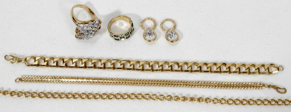COSTUME, CLEAR STONES & GOLD TONE JEWELRY: COSTUME, CLEAR STONES & GOLD TONE NECK CHAIN, L 23", BRACELETS, L 7 1/2", & RINGS, SIX PIECES:Having 1 unmarked gold colored chain necklace L 23"; 2 unmarked gold colored chain bracelets L 7 1/2"; 1 u