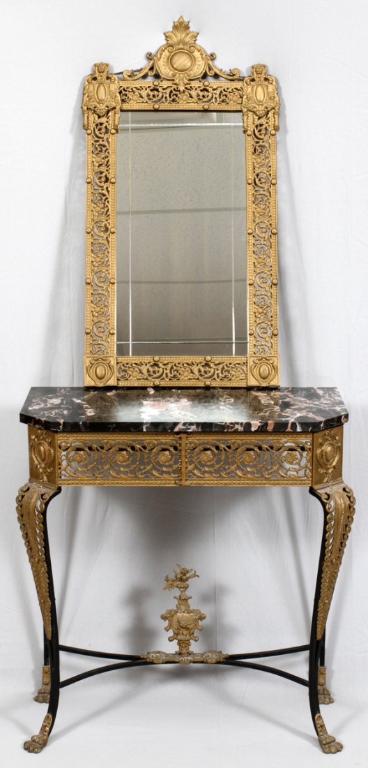 WROUGHT IRON BRASS MARBLE TOP CONSOLE & MIRROR: WROUGHT IRON BRASS MARBLE TOP CONSOLE & MIRROR, H 33", L 31", D 13":Gilt wrought iron frame with leaf crest and pierced acanthus leaf design, 38" x 20". Console table with black marble top gilt wrough