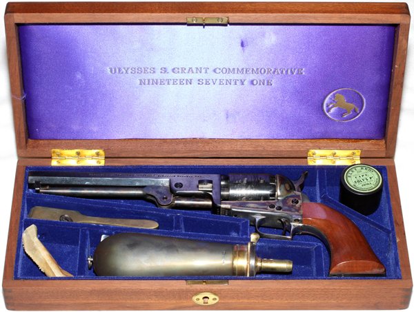 COLT MODEL 1851 NAVY ULYSSES S. GRANT COMMEMORATIVE: COLT .36 CAL MODEL 1851 NAVY ULYSSES S. GRANT COMMEMORATIVE 1971 PERCUSSION CAP REVOLVER, L 7 1/2" BBL, #3109 USG:Having a 7 1/2" octagonal blued barrel. Engraved and blued cylinder depicting Naval sc