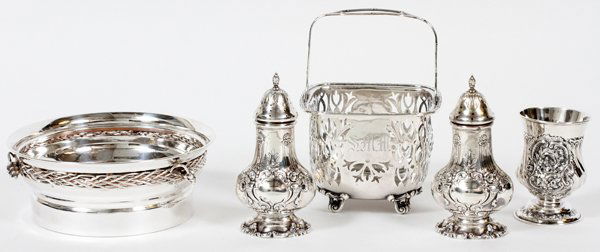 ENGLISH & AMERICAN STERLING TABLEWARE 5 PIECES: ENGLISH & AMERICAN STERLING TABLEWARE, FIVE PIECES:Including a wine coaster, 1 filigree basket, salt and pepper shakers, and 1 toothpick urn. Approximately 13.11 troy ounces weighable. From the estate