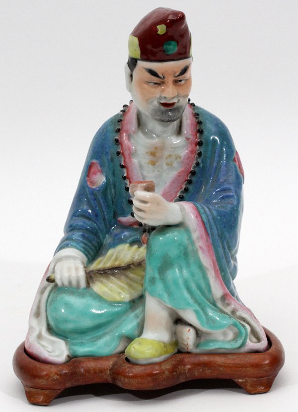 CHINESE MULTICOLORED CERAMIC SEATED FIGURE (1 of 2)