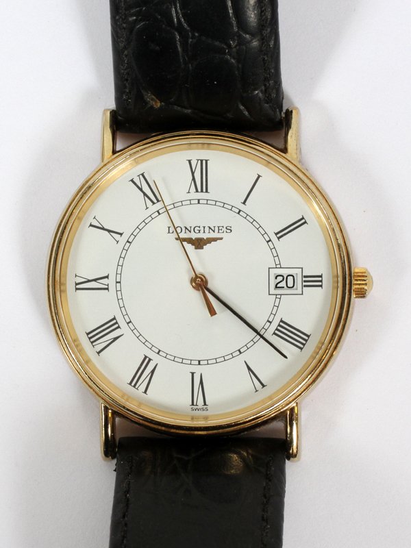 LONGINES GENT'S WRIST WATCH: LONGINES, GENT'S WRIST WATCH:Dial with date. #37438999. Black leather strap. Stem wind. Working now. For a high resolution photo CLICK HERE