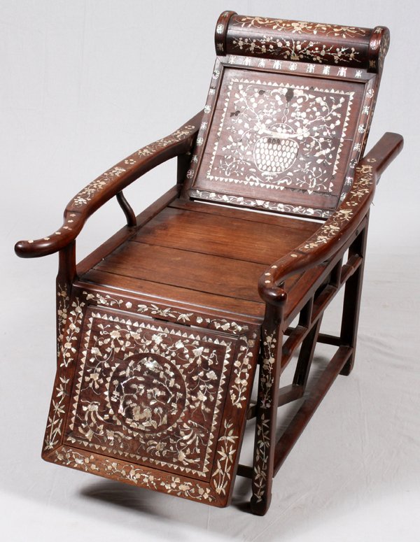ROSEWOOD & MOTHER-OF-PEARL RECLINING CHAIR: ROSEWOOD & MOTHER-OF-PEARL RECLINING CHAIR, H 37", L 24", D 42":Oriental reclining chair, embedded with hundreds of carved mother of pearl symbols. For a high resolution photo
