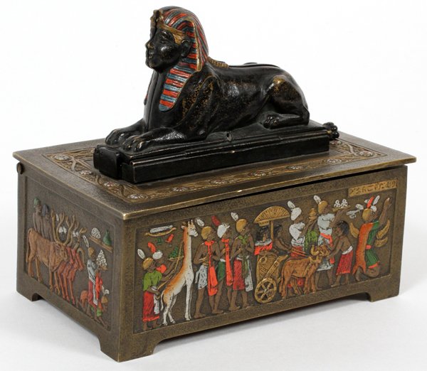 AUSTRIAN COLD PAINTED BRONZE BOX: AUSTRIAN COLD PAINTED BRONZE BOX, H 5.75", L 6.25", D 4" Circa 1940's:Depicting scenes with figures and animals. The top features a sphinx which opens to reveal a female nude. Marked Made in Austria. 