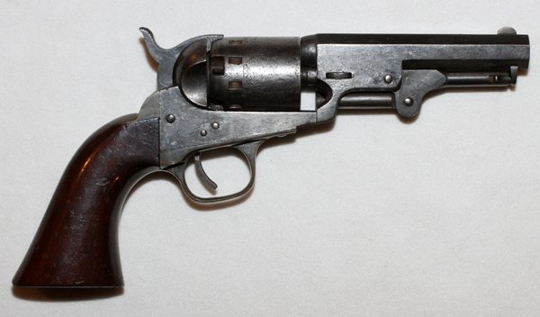 MANHATTAN PERCUSSION CAP REVOLVER .36 CAL: MANHATTAN, PERCUSSION CAP REVOLVER, .36 CAL SINGLE ACTION, L 4" BBL,, #3690:Pocked model, 5 shot cylinder, with a 4" octagonal barrel. Stamped "Manhattan Fire Arms MFG Co., New York". Walnut grips. Se