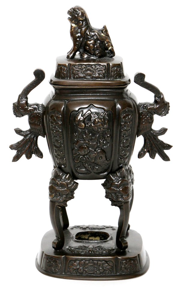 CHINESE BRONZE INCENSE BURNER LATE 19TH C.: CHINESE BRONZE INCENSE BURNER, LATE 19TH C., H 10 3/4":Bird and floral panels, flanked by handles, the cover centered by a Fu dog finial. From the collection of Mr. Arthur Roshak, Grosse Pointe Farms,