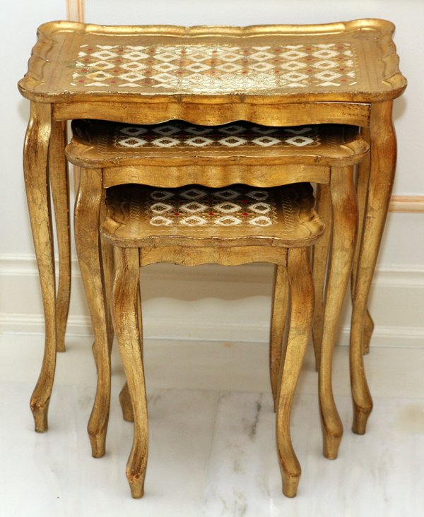FLORENTINE STYLE GILT WOOD NEST OF THREE TABLES: FLORENTINE STYLE GILT WOOD NEST OF THREE TABLES, H 23", W 22":Rectangular shape with scalloped edge. From the collection of Mr. Arthur Roshak, Grosse Pointe Farms, Michigan.