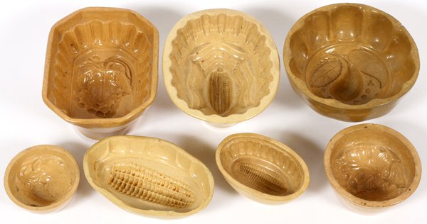 YELLOW WARE POTTERY CAKE MOLDS 7 PIECES (1 of 2)