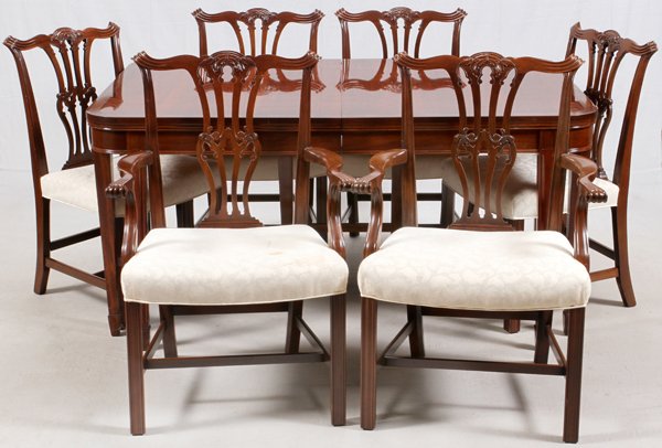 MAHOGANY DINING TABLE & SET OF SIX CHAIRS: MAHOGANY DINING TABLE & SET OF SIX CHAIRS:Featuring a dining table H 30.5", L 62", D 42" accompanied by one leaf L 12" with three custom table pads. Also included are 2 armchairs and 4 side chairs. Se