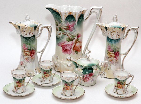 R.S. PRUSSIA PORCELAIN TABLEWARE 12 PIECES: R.S. PRUSSIA PORCELAIN TABLEWARE, 12 PIECES, H 4 1/2"-10":Including 1 water pitcher, 2 chocolate pots. 1 covered creamer, 4 cups, and 4 saucers.