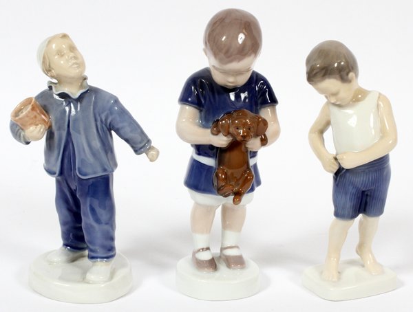 BING AND GRONDAHL PORCELAIN FIGURES 3 PCS.: BING AND GRONDAHL PORCELAIN FIGURES, 3 PCS., H 6"- 7":Including numbers 1747, 1759, 2251. Measuring H.6" - 6 3/4". Made in Denmark and hand painted.