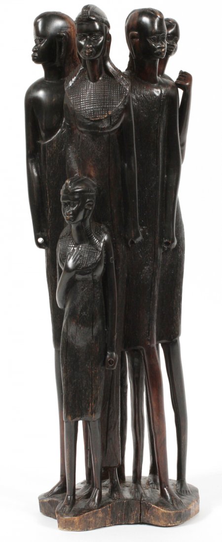 KENYA EBONY CARVED SCULPTURE: KENYA, EBONY CARVED SCULPTURE H 18.5":Depicts a group of six figures including a child. Well carved from a single piece of wood. Possibly Masai.