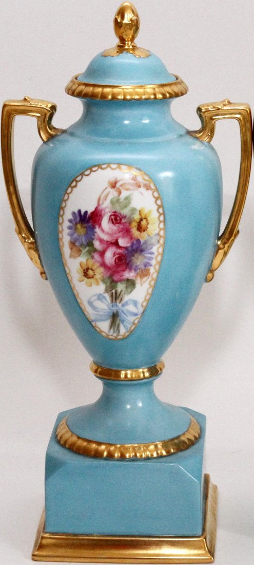 FRENCH PORCELAIN COVERED URN H 13": FRENCH PORCELAIN COVERED URN H 13": With an oval hand painted floral spray reserve at the front and back, over a robin's egg blue ground with fired gold accents. Numbered underneath (see additional ph