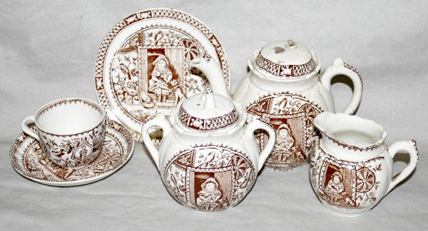 STAFFORDSHIRE POTTERY CHILD'S TEA SET, AS IS: STAFFORDSHIRE POTTERY CHILD'S TEA SET, 19TH CENTURY, 18 PIECES, AS IS CONDITION:Including 1 teapot H 4", 1 creamer, 1 covered sugar, 5 demi-tasse cups and 5 saucers, and 6 bread and butter plates Dia