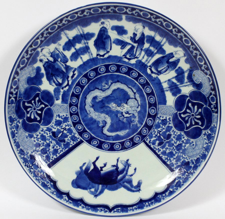 CHINESE BLUE AND WHITE PORCELAIN CHARGER: CHINESE BLUE AND WHITE PORCELAIN CHARGER, DIA 20":Decorated with figures on horses and dragons. From the Estate of Daniel Clancy, Voltaire Place, Grosse Pointe Farms.