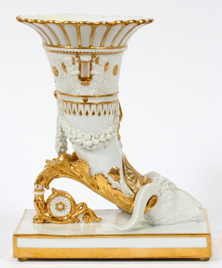 SEVRES PORCELAIN CORNUCOPIA: SEVRES PORCELAIN CORNUCOPIA, H 10", W 8", D 4 1/4":With ram's head and fired gold accents, with incised Sevres mark, and numbered 18. From the Estate of Daniel Clancy, Voltaire Place, Grosse Pointe Fa