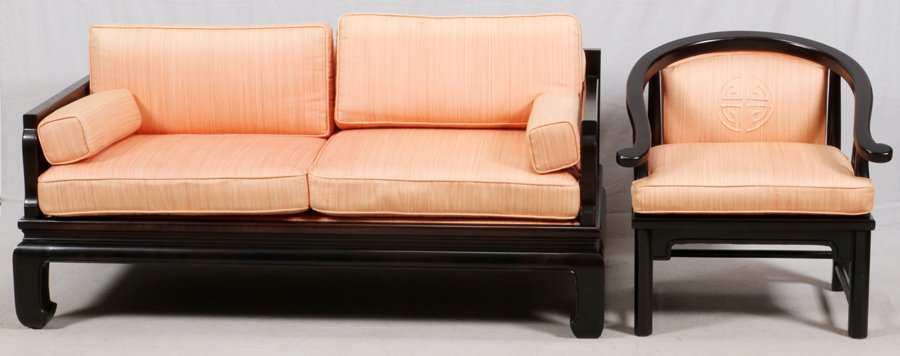 CHINESE TEAKWOOD SOFA AND ARMCHAIR: CHINESE TEAKWOOD SOFA AND ARMCHAIR:Having peach cushions and arm rests. Teakwood frames 30''H x 66''W x 34''D. Sofa 29''H x 29''W x 27''D