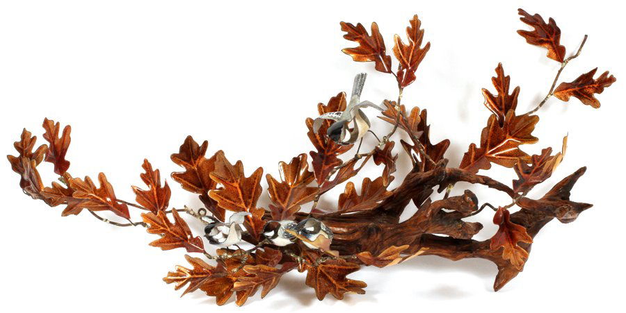 NORMAN BRUMM ENAMEL ON COPPER SCULPTURE: NORMAN BRUMM, ENAMEL ON COPPER SCULPTURE, CHICKADEES ON OAK LEAVES:hand made. Signed on the bottom of one Bird and on wood.