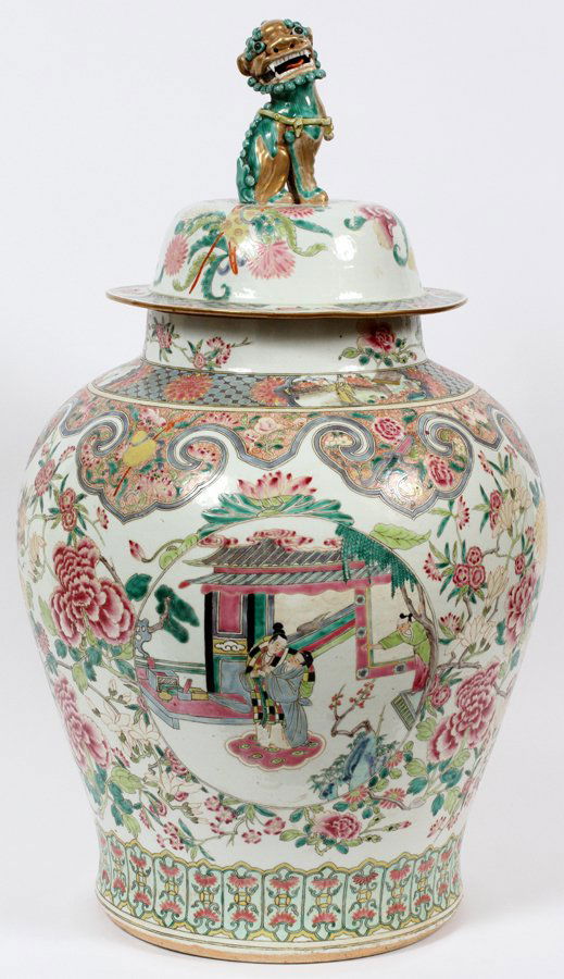 CHINESE PORCELAIN COVERED URN C. 1890: CHINESE PORCELAIN COVERED URN, C. 1890, H 27 1/2", DIA 16":Having a Foo lion finial with open mouth, a lid with gilt fired gold accents. Heavily decorated in floral designs with circular medallions de