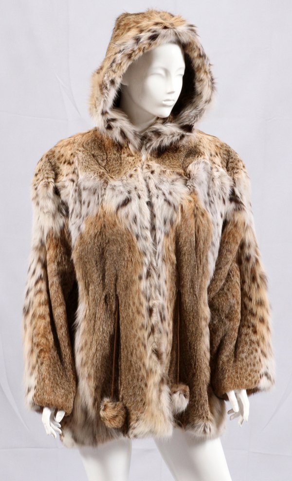 BOBCAT COAT SIZE 8-10: BOBCAT COAT, SIZE 8-10:This coat is a size 8-10 and it is mid length.