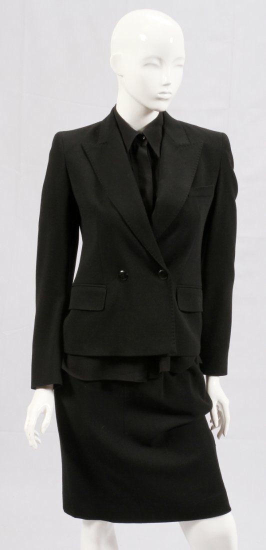 MAX MARA BLACK KNIT BLEND SKIRT SUIT: MAX MARA BLACK KNIT BLEND SKIRT SUIT, SIZE 8:Including a black knit blend jacket and skirt, together with a black blouse. Labeled: Max Mara, Made in Italy, size 8.