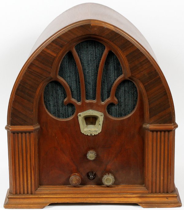 PHILCO MODEL 90 CATHEDRAL RADIO: PHILCO MODEL 90 CATHEDRAL RADIO, H 18.5", L 17.25", D 11.75":A Philco Model 90 cathedral style radio in a walnut case.