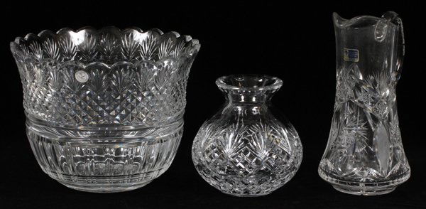 CRYSTAL PUNCH BOWL & GERMAN CRYSTAL PITCHER & VASE: CRYSTAL PUNCH BOWL & GERMAN HAND CUT CRYSTAL WATER PITCHER & VASE:Crystal punch bowl, Poland, Dia 10", H 7 1/2". German hand cut crystal water pitcher, H 9 1/2". Hand cut bulbous crystal vase, H 6".