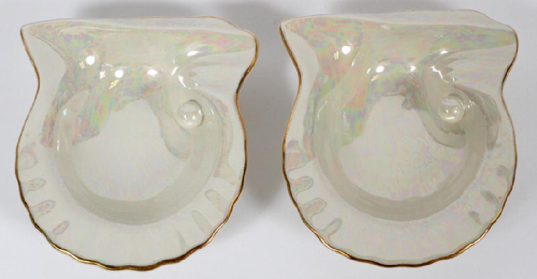 MIKIMOTO PEARLS PORCELAIN OYSTER FORM DISHES: MIKIMOTO PEARLS, PORCELAIN OYSTER FORM DISHES H 1", W 4 1/2", L 5":Vintage 'Mikimoto Pearls' Lusterware Oyster Shaped Ashtrays or Dish/Promotional Pieces. Fired gold trim. "Mikimoto Pearls" inscribed 