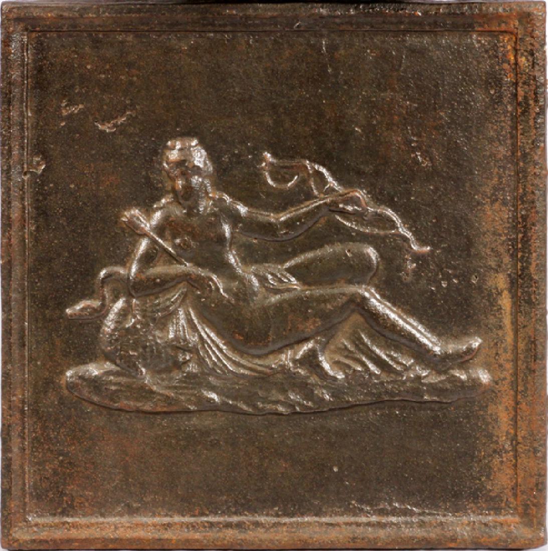 CAST IRON FIREBACK DEPICTING GODDESS DIANA: CAST IRON FIREBACK DEPICTING GODDESS DIANA, H 19", L 19",:A square cast iron fireback. Depicting the goddess Diana reclining on a swan. Height 19", length 19".