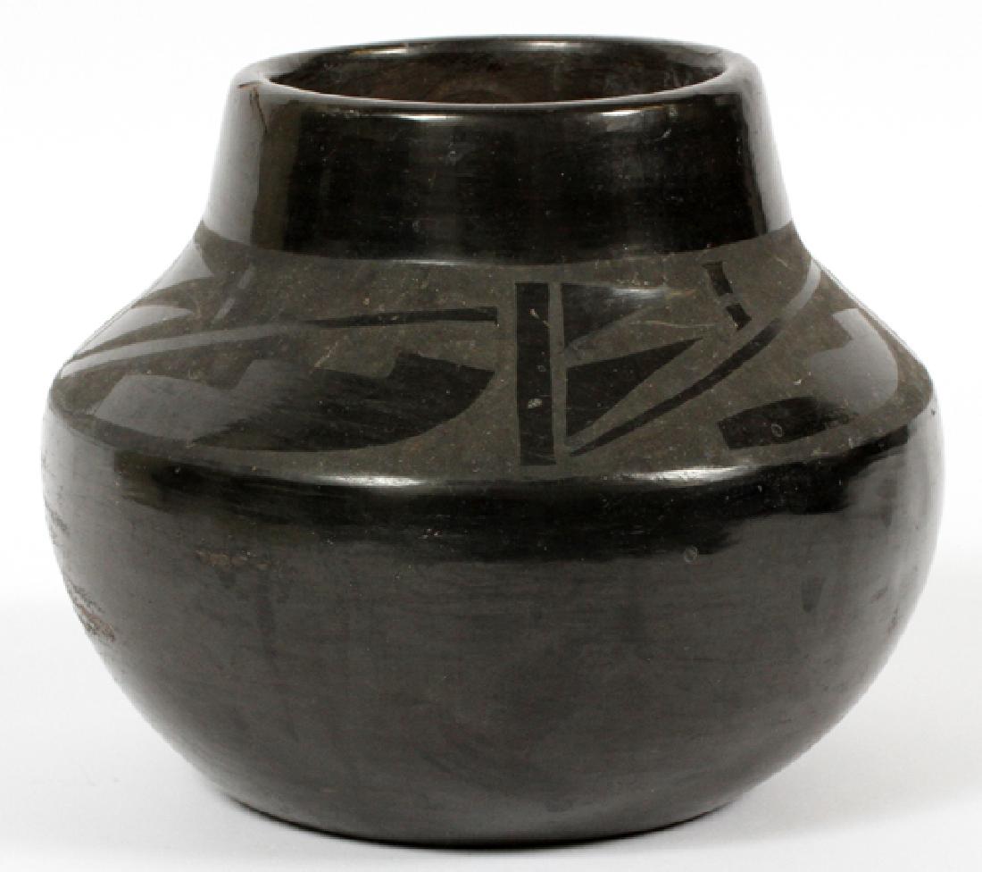 KERTHA FENDER SAN ILDEFONSO PUEBLO POTTERY VASE: KERTHA FENDER, SAN ILDEFONSO, PUEBLO, BLACK ON BLACK POTTERY VASE, C 1900 H 5":Native American seed pot. Signed in pencil on base: "Kertha Fender" and "San Ildefonso Pueblo". Scratches to glaze and gl