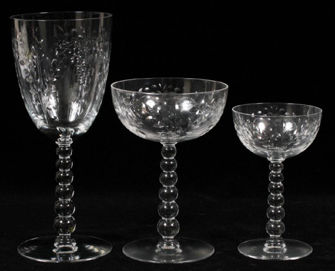 HAND CUT CRYSTAL STEMWARE CIRCA 1940 18 PCS: HAND CUT CRYSTAL STEMWARE, CIRCA 1940, 18 PCS, H 5" - 8":8 wines, 8 champagnes, 8 water goblets. Perhaps by Seneca Co. Six stacked balls at stem.