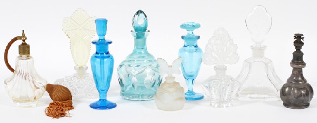 NINE PERFUME BOTTLES (1 of 3)