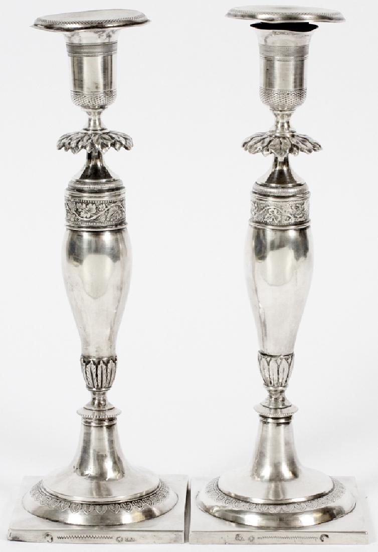 PAIR OF WEIGHTED SILVER CANDLESTICKS POSSIBLY HANAU (1 of 4)
