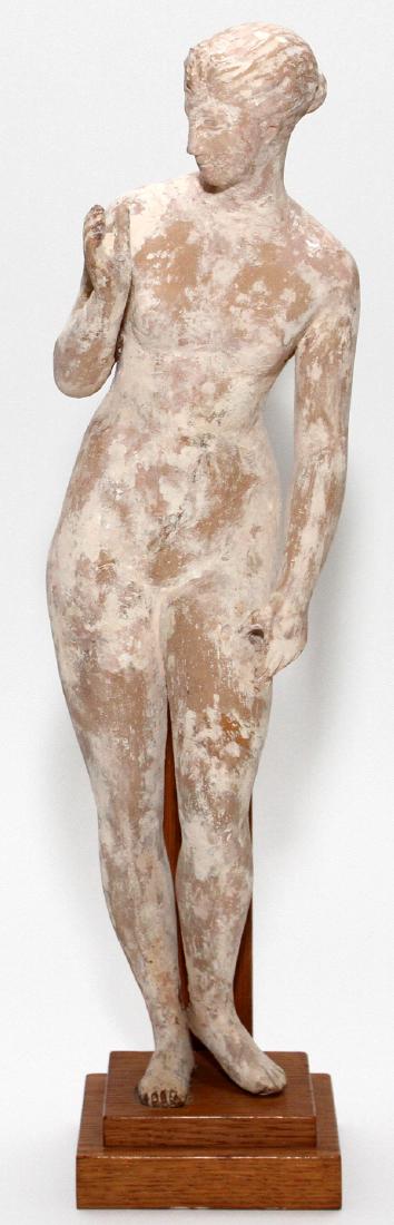 TERRACOTTA SCULPTURE: TERRACOTTA SCULPTURE, H 16 1/2", W 4 1/2", NUDE FEMALE:On a modern wood base. Distressed finish. From the Estate of Daniel Clancy, Voltaire Place, Grosse Pointe Farms, Michigan.