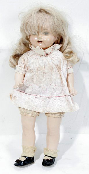 EFFANBEE COMPOSITION & CLOTH 'ROSEMARY' DOLL: EFFANBEE U.S.A., COMPOSITION AND CLOTH 'ROSEMARY' DOLL, H 19":Composition head with blue sleep eyes, hand painted features and open mouth revealing teeth. Marked "Effanbee U.S.A. Rosemary" about neck.