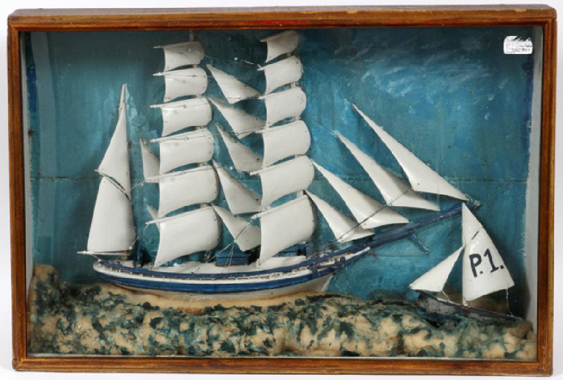 CARVED AND PAINTED SHIP DIORAMA: CARVED AND PAINTED SHIP DIORAMA 19TH C., IN SHADOW BOX H 19.5", L 29":Framed shadow box model of a two masted clipper ship under full sail, with tug boat to front. Tug boat with sails reading "P.1.".