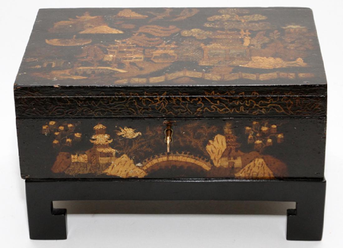 JAPANESE LETTER BOX ON STAND: JAPANESE LETTER BOX ON STAND, H 6 1/2", W 11":A hinged lid with key, on bracket feet. From the Estate of Daniel Clancy, Voltaire Place, Grosse Pointe Farms.