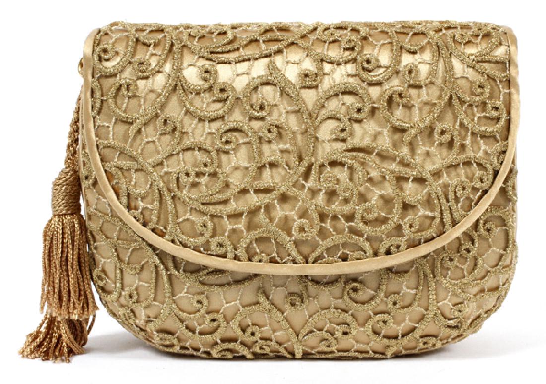 JUDITH LEIBER BEIGE LACE AND SATIN BAG: JUDITH LEIBER BEIGE LACE AND SATIN BAG, W 6":Beige satin and openwork lace flap bag with corded optional shoulder strap. Magnetic snap closure opens to single pocket interior with single slip pocket.