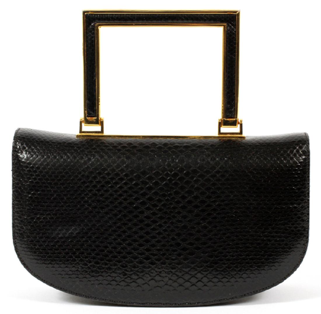 JUDITH LEIBER BLACK KARUNG BAG: JUDITH LEIBER BLACK KARUNG BAG, W 7 1/8":Black karung evening bag surmounted with a single square gold toned handle with matching karung detail. Snap closure opens to single pocket and single slip poc