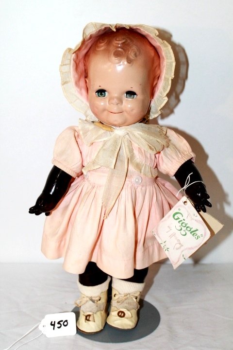 14" CUTTELY KEWPIE COMPOSITION LATEX BODY JOINTED BLACK: 14" CUTTELY KEWPIE COMPOSITION LATEX BODY JOINTED BLACK GIGGLES 55 BY ROSE O'NEILL EFFANBEE DOLLS - SOME CRAZING. BODY TURNED DARK. FAIR CONDITION.
