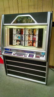 ROWE AMi CD100 JUKEBOX: Used item. Powers up unless otherwise noted: Loaded with CDs