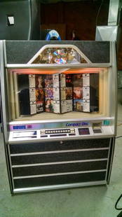 ROWE AMi CD100 JUKEBOX: Used item. Powers up unless otherwise noted: Loaded with CDs.