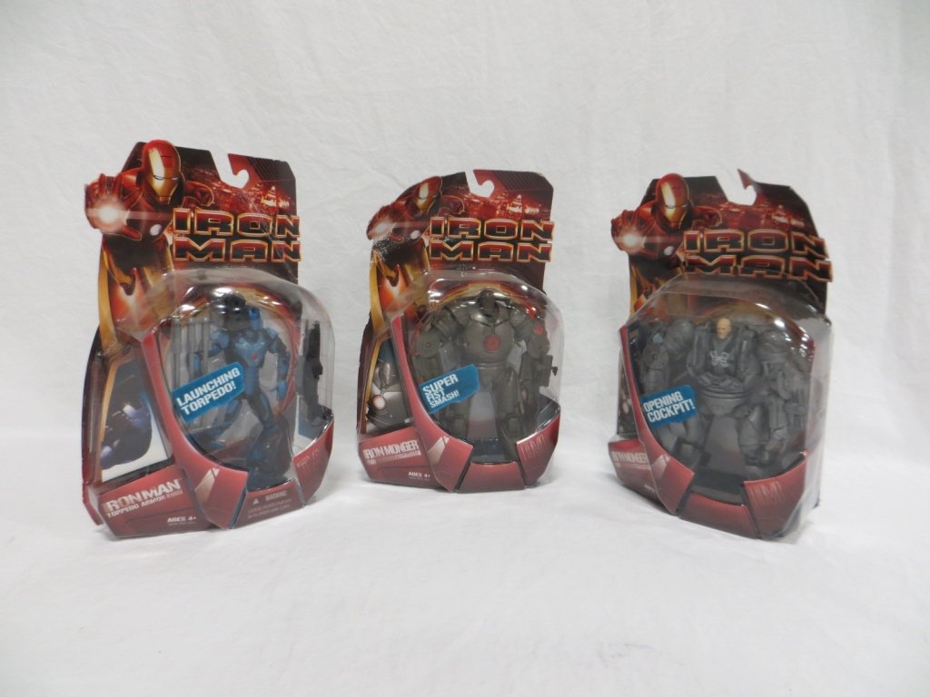 SET OF 3 - IRON MAN ACTION FIGURES: Condition: New in box. Set of 3 - Iron Man action figures. Includes: Iron Man Torpedo Armor, Iron Monger, Iron Monger w/opening cockpit (package partially open).
