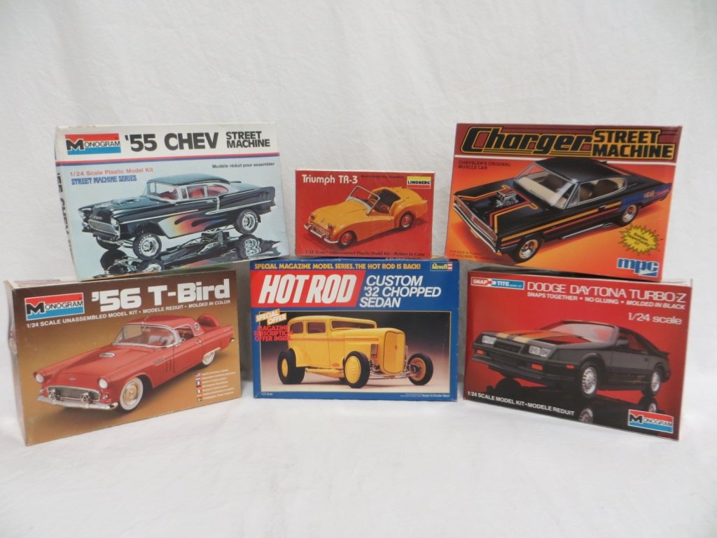 SET OF 6 - UNBUILT MODEL CAR KITS: Condition: Good. Set of 6 - unbuilt model car kits. Includes: Lindberg Triumph TR-3, Revell Custom '32 Chopped Sedan, Monogram '56 T-Bird; Dodge Daytona Turbo-Z & '55 Chev Street Machine and MPC Charg